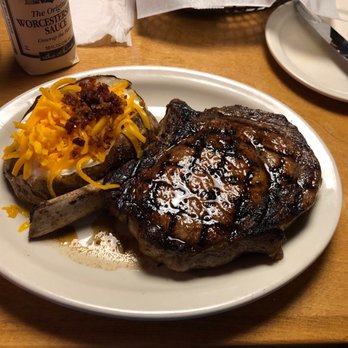 Texas Roadhouse - The Bone-In Ribeye with the loaded baked potato. - Barbeque Near Me - Carmel, Indiana Texas Roadhouse - The Bone-In Ribeye with the loaded baked potato. - Barbeque Near Me - Carmel, Indiana