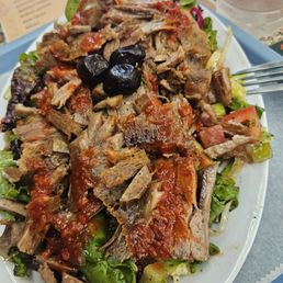 Mediterranean salad topped with Lamb. 10 out of 10