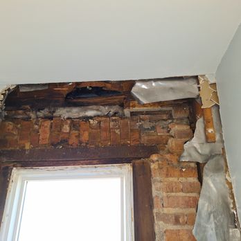Legacy Inspection Group - A close up once the Collapsing bricks were removed as well as the frame wood frame was all mulch. - Home Inspectors Near Me - Mundelein, Illinois Legacy Inspection Group - A close up once the Collapsing bricks were removed as well as the frame wood frame was all mulch. - Home Inspectors Near Me - Mundelein, Illinois