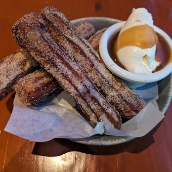 Terra Plata - Churros with chili-chocolate ganache, caramel, and whipped cream - New American Near Me - Seattle, Washington Terra Plata - Churros with chili-chocolate ganache, caramel, and whipped cream - New American Near Me - Seattle, Washington