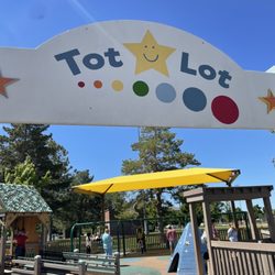 Orem City Center Park - The entrance (which is right next to the main hub) to the Tot Lot. More provided shade for parents over the swings here as well.