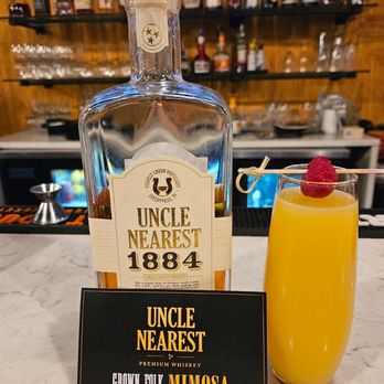 CheSa’s Bistro & Bar - a bottle of uncle nearest next to a glass of orange juice - Gluten-Free Near Me - Chicago, Illinois CheSa’s Bistro & Bar - a bottle of uncle nearest next to a glass of orange juice - Gluten-Free Near Me - Chicago, Illinois