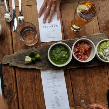 Penca - Order guacamole, get a trendy wooden plate of things. Leftmost seemed like a cilantro jalapeno tomatillo situation. Very yum. - Mexican Near Me - Tucson, Arizona Penca - Order guacamole, get a trendy wooden plate of things. Leftmost seemed like a cilantro jalapeno tomatillo situation. Very yum. - Mexican Near Me - Tucson, Arizona