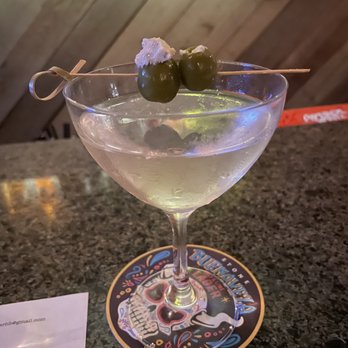 The Corner - Dirty martini w blur cheese olives - New American Near Me - Huntington Beach, California The Corner - Dirty martini w blur cheese olives - New American Near Me - Huntington Beach, California