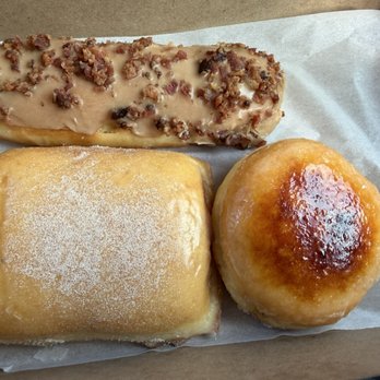 SloDoCo Donuts - A Pillow donut, a chai donut and a maple bacon bar. - Donuts Near Me - San Luis Obispo, California SloDoCo Donuts - A Pillow donut, a chai donut and a maple bacon bar. - Donuts Near Me - San Luis Obispo, California