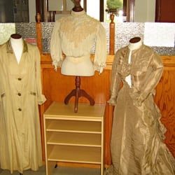 Morgan County Archives - Some period clothing on main floor of the Achives