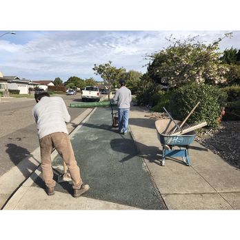 Kozuki Landscaping - two men working on a sidewalk - Landscaping Near Me Kozuki Landscaping - two men working on a sidewalk - Landscaping Near Me