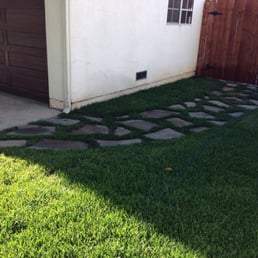 Sprinklers, new grass and gray flag stone path! Sprinklers, new grass and gray flag stone path!