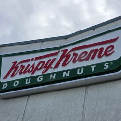 The Krispy Kreme sign high above its store front near the Crossroads area of Roanoke, Virginia.