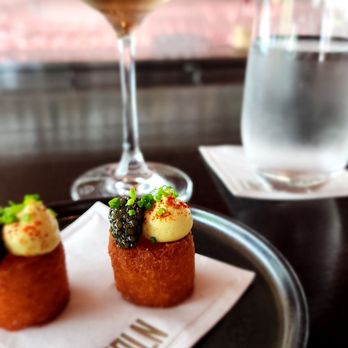Lincoln Ristorante - Potato and Caviar with a glass of Sancerre. - Italian Near Me - New York, New York Lincoln Ristorante - Potato and Caviar with a glass of Sancerre. - Italian Near Me - New York, New York