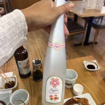 Sukihana - $21 white peach sake bottle - Ramen Near Me - Salt Lake City, Utah Sukihana - $21 white peach sake bottle - Ramen Near Me - Salt Lake City, Utah