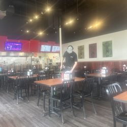 MOOYAH Burgers, Fries & Shakes - Samuel cleaning in between taking orders