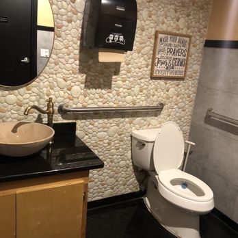 Teriyaki Box - a bathroom with a toilet and sink - Sushi Bars Near Me - Kennesaw, Georgia
