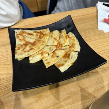Dough Zone Dumpling House - Green Onion Pancake (1) 葱油饼 - Dim Sum Near Me - San Jose, California Dough Zone Dumpling House - Green Onion Pancake (1) 葱油饼 - Dim Sum Near Me - San Jose, California