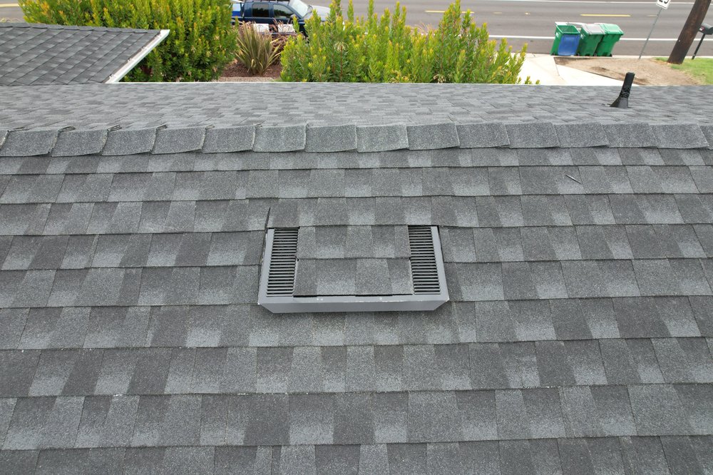 Slide of Prestige Roofing