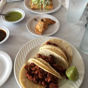 Los 4 Hermanos - From top to bottom: chicken flanta, beef empanada, spicy pork tacos - Mexican Near Me - North Brunswick Township, New Jersey