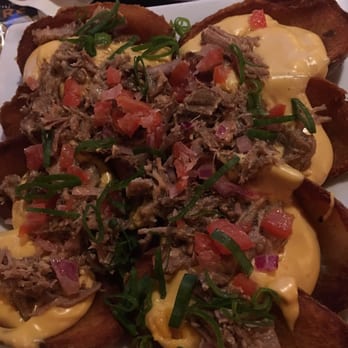 Taps & Apps - Kalua pork potato skins - New American Near Me - Mililani, Hawaii