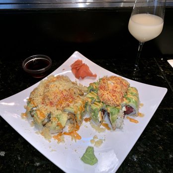 Sushi Maru - (L) What the Buck (R) Volcano Ponzu sauce not soy sauce and unfiltered sake - Sushi Bars Near Me - Brandon, Florida Sushi Maru - (L) What the Buck (R) Volcano Ponzu sauce not soy sauce and unfiltered sake - Sushi Bars Near Me - Brandon, Florida
