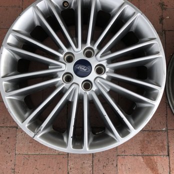 Premier Automotive Wheel Specialists - Before. Big gashon bottom left. - Wheel & Rim Repair Near Me