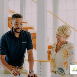 101 Mobility of West Michigan - A 101 Mobility expert explains mobility equipment options to a customer during a free in home mobility consultation.