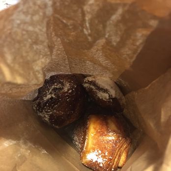 La Patisserie - Everything in one bag, crobrios, maple pecan bun, beignet, and kouign amann! - Desserts Near Me - Austin, Texas