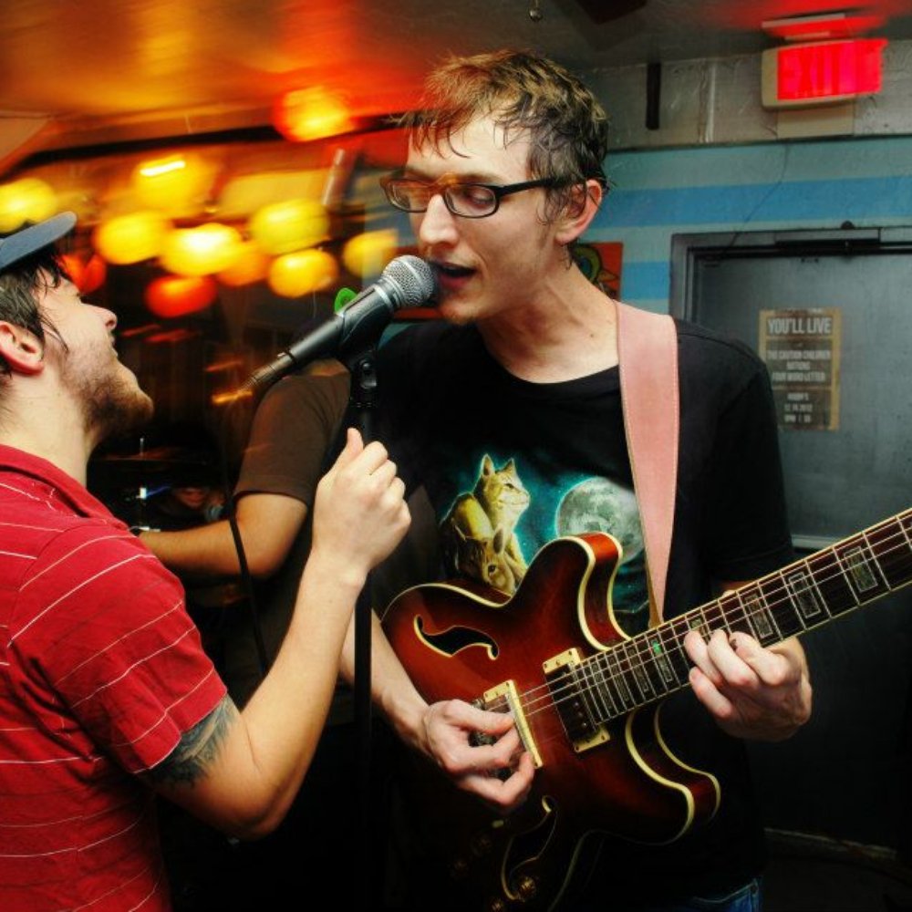 Shanghai Nobby's - two young men singing and playing guitar - Bars Near Me - Saint Augustine, Florida Shanghai Nobby's - two young men singing and playing guitar - Bars Near Me - Saint Augustine, Florida