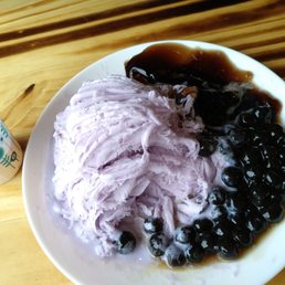 Mango sauce in the side cup (way too sweet). Taro with boba and herbal jelly, yum! Mango sauce in the side cup (way too sweet). Taro with boba and herbal jelly, yum!