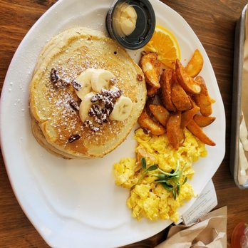 Revelations Cafe - Carpenter Plate with scrambled eggs, banana nut pancakes and potatoes. - Breakfast & Brunch Near Me - Lutz, Florida