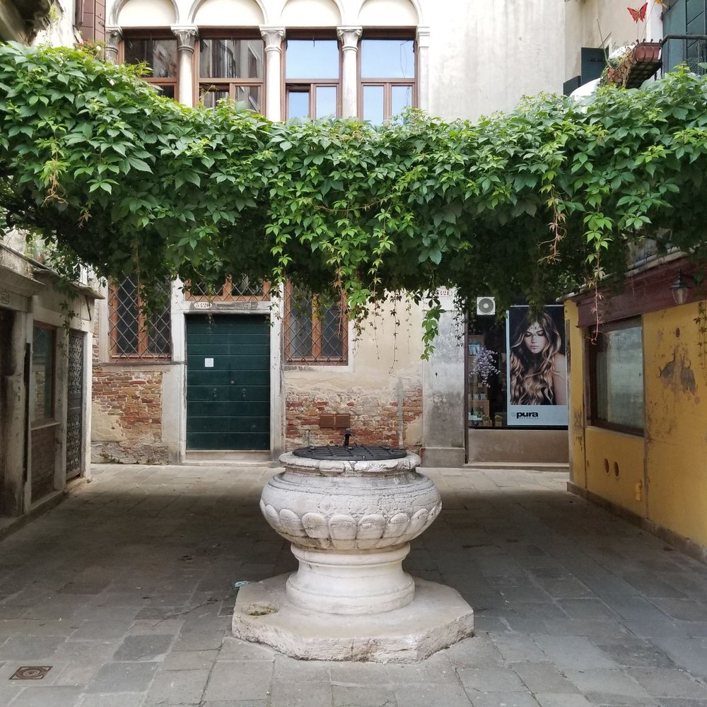 La Colonna - Near the entrance of restaurant. This is one of many old wells in Venice. - Italian Near Me - Venezia, AG La Colonna - Near the entrance of restaurant. This is one of many old wells in Venice. - Italian Near Me - Venezia, AG