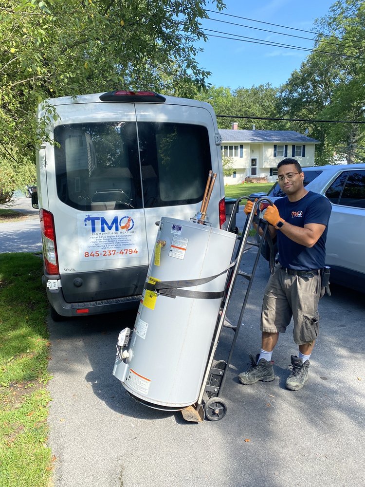 Slide of TMO Plumbing, Heating, and Electrical