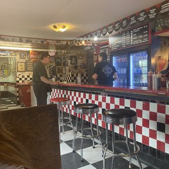 Easterbrook Hotdog Stand - a checkered bar with stools - Burgers Near Me - Burlington, Ontario Easterbrook Hotdog Stand - a checkered bar with stools - Burgers Near Me - Burlington, Ontario