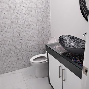 Kiev Home Renovations - a bathroom with a sink and toilet - General Contractors Near Me - Surrey, British Columbia Kiev Home Renovations - a bathroom with a sink and toilet - General Contractors Near Me - Surrey, British Columbia