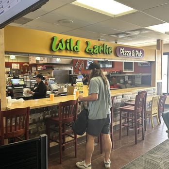 Wild Garlic - Bar stool seating area - note the sign work - Pizza Near Me - Reno, Nevada