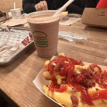 Shake Shack Upper East Side - Chocolate shake and bacon & cheese fries - Burgers Near Me - New York, New York Shake Shack Upper East Side - Chocolate shake and bacon & cheese fries - Burgers Near Me - New York, New York