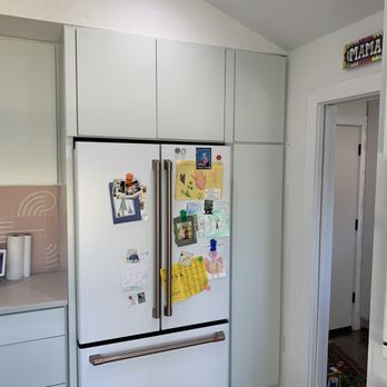 Recon Custom Cabinets - a refrigerator in a kitchen - Cabinetry Near Me Recon Custom Cabinets - a refrigerator in a kitchen - Cabinetry Near Me