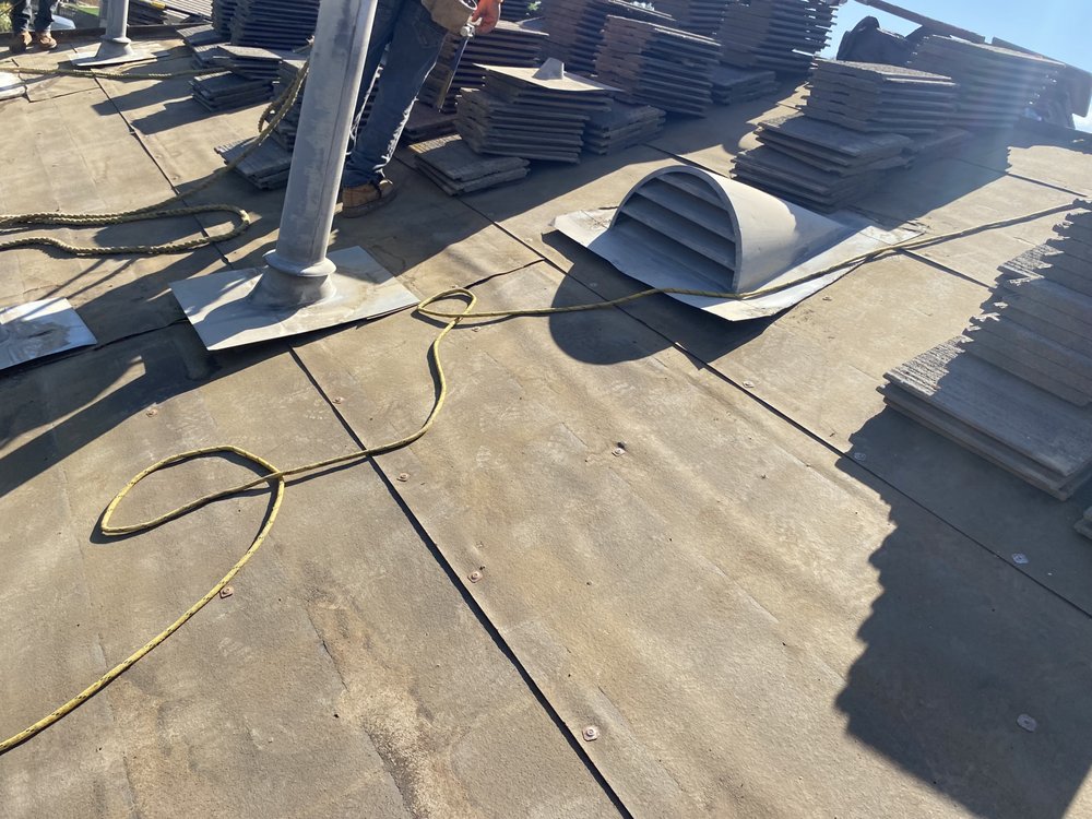 Slide of JUVA Roofing