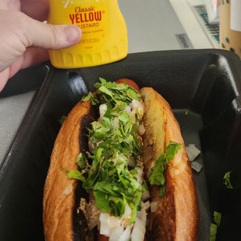 The Desert Hog - I got the Sonoran dog with Chipotle creme, onions and cilantro.  DELICIOUS - Food Trucks Near Me