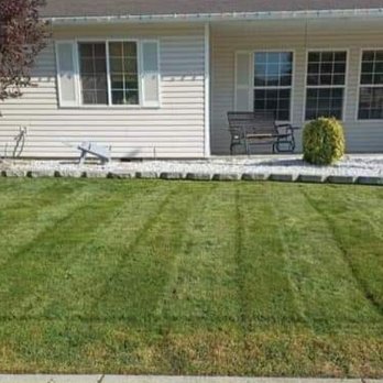 Rams Lawn Care - the front yard of a home - Tree Services Near Me