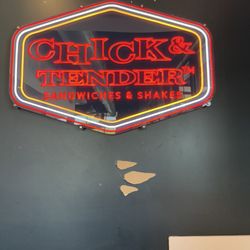 Chick & Tender - It's like they ripped off the old PDQ sign and slapped the branding up. How about some paint?