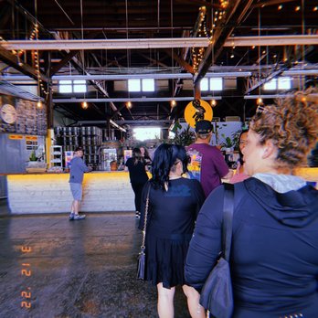 Brouwerij West - a group of people standing in a building - Breweries Near Me - San Pedro, California Brouwerij West - a group of people standing in a building - Breweries Near Me - San Pedro, California
