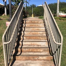 If the library is closed park along the side and go up these stairs to get to the book drop off