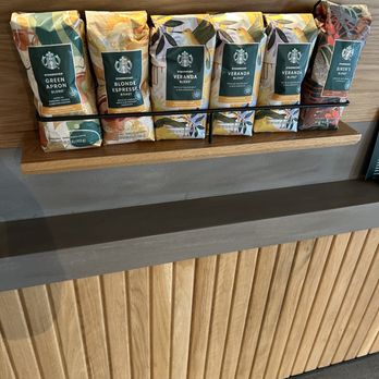 Starbucks - a display of coffee bags on a counter - Coffee & Tea Near Me - Pembroke Pines, Florida Starbucks - a display of coffee bags on a counter - Coffee & Tea Near Me - Pembroke Pines, Florida