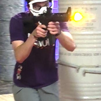 The Colosseum - Person playing gel blaster - Axe Throwing Near Me - Layton, Utah The Colosseum - Person playing gel blaster - Axe Throwing Near Me - Layton, Utah