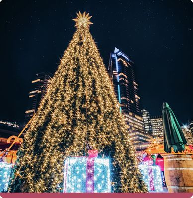 Walk- Through Christmas Tree - Make it a December to remember by taking a stroll into our magical 30-foot-tall walk-through Christmas tree. Step into a whimsical space filled with twinkling lights (50,000 of them!) and adorned with glowing gifts and shimmering ornaments.
It’s sure to create dear holiday memories for you and your loved ones. After all, Christmas treasures are always found under the tree.
To you, with wishes all aglow. Walk- Through Christmas Tree - Make it a December to remember by taking a stroll into our magical 30-foot-tall walk-through Christmas tree. Step into a whimsical space filled with twinkling lights (50,000 of them!) and adorned with glowing gifts and shimmering ornaments.
It’s sure to create dear holiday memories for you and your loved ones. After all, Christmas treasures are always found under the tree.
To you, with wishes all aglow.