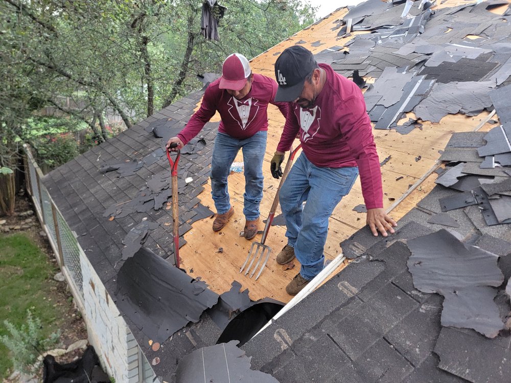 Slide of Tux Roofing