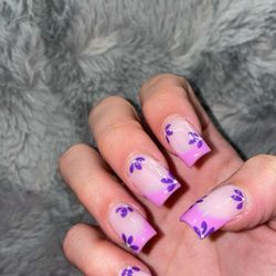 The beautiful turn out of my purple flowered nails
