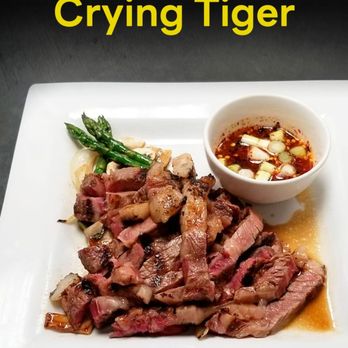 Tara Thai Kitchen - a plate of meat with a bowl of dipping sauce - Thai Near Me - El Paso, Texas Tara Thai Kitchen - a plate of meat with a bowl of dipping sauce - Thai Near Me - El Paso, Texas