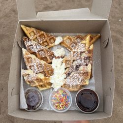 Shorebreak Bakery Cafe - Waffle box! Came with 4 waffles and 3 toppings! Was plenty for my husband and I to share sitting on the beach!