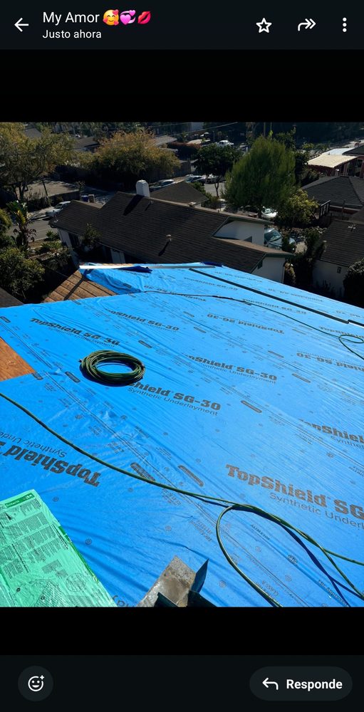Slide of E&J Roof Service