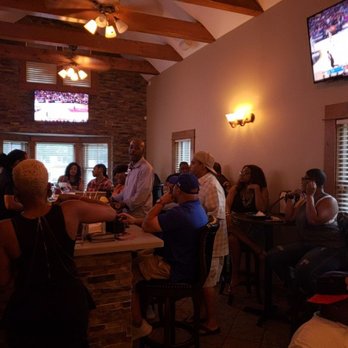 Smoke & Sip - a group of people sitting at a bar - Cigar Bars Near Me - Florissant, Missouri Smoke & Sip - a group of people sitting at a bar - Cigar Bars Near Me - Florissant, Missouri